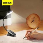 Baseus Comfort Reading Mini Clip Lamp – Portable & Eye-Friendly | DeshiBD.com Illuminate your reading, studying, or work with the Baseus Comfort Reading Mini Clip Lamp, a compact and versatile lighting solution designed for comfort and convenience. Its adjustable clip and flexible neck make it perfect for books, laptops, desks, or bedside tables, providing bright, even light without straining your eyes. 💡 Key Features: Brand: Baseus Type: Mini Clip Lamp Design: Compact, portable, and lightweight for easy use anywhere Clip Function: Strong adjustable clip fits books, laptops, desks, and tables Lighting: Soft, eye-friendly illumination for comfortable reading or working Adjustable Angle: Flexible neck allows precise light positioning Power Source: USB-powered for convenient plug-and-play use Usage: Ideal for reading, studying, crafting, or late-night work Material: Durable and lightweight construction for long-lasting use ✨ Why Choose the Baseus Mini Clip Lamp from DeshiBD.com? The Baseus Comfort Reading Mini Clip Lamp provides a convenient, portable, and eye-friendly lighting solution for students, professionals, and avid readers. Its flexible design and adjustable clip ensure the perfect lighting angle every time, while the soft LED illumination reduces eye fatigue during extended reading or work sessions. Take your reading and work setup to the next level with the Baseus Mini Clip Lamp — lightweight, durable, and designed for maximum comfort. Keywords: Baseus Mini Clip Lamp, Baseus reading lamp, portable clip lamp, eye-friendly LED lamp, USB reading light, desk lamp for study, Baseus lamp Bangladesh, DeshiBD lighting accessories.